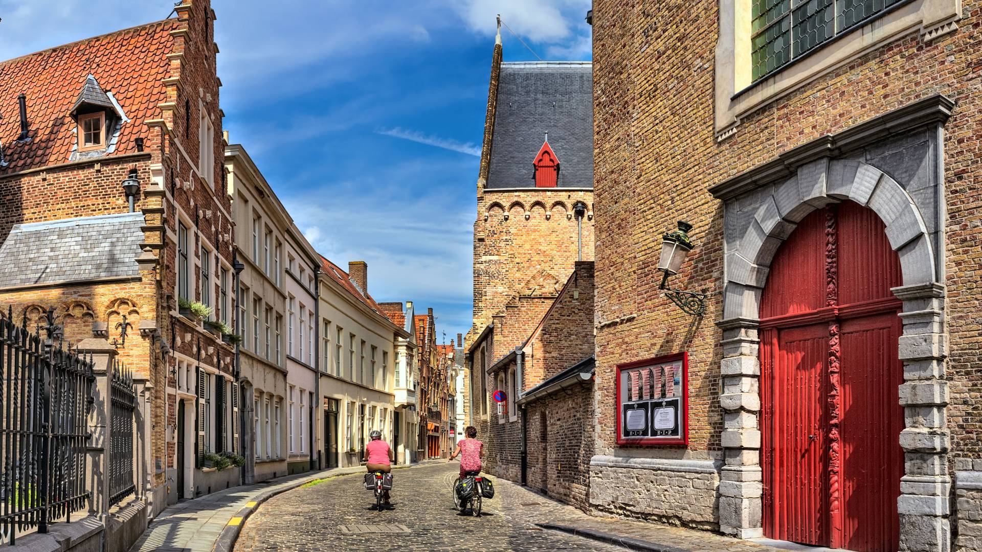 Cyclist cobblestoan road Bruges